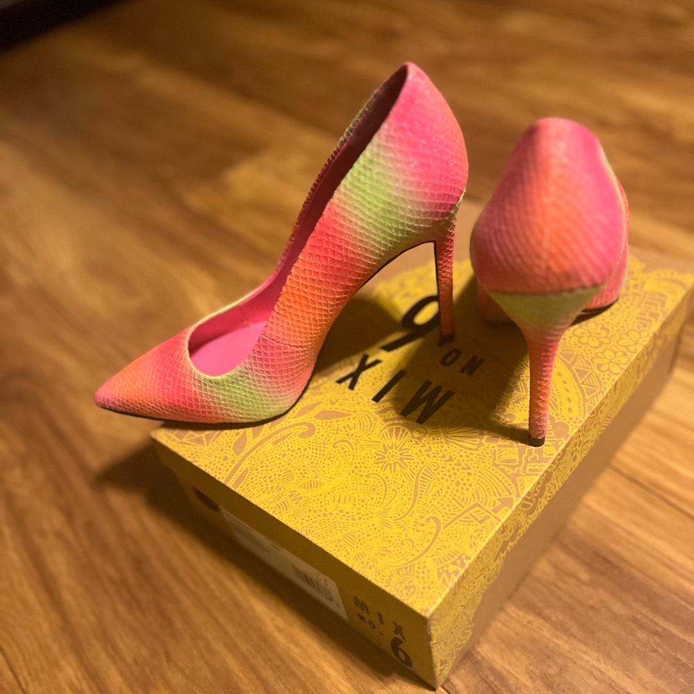 Multi colored high heel shoe.